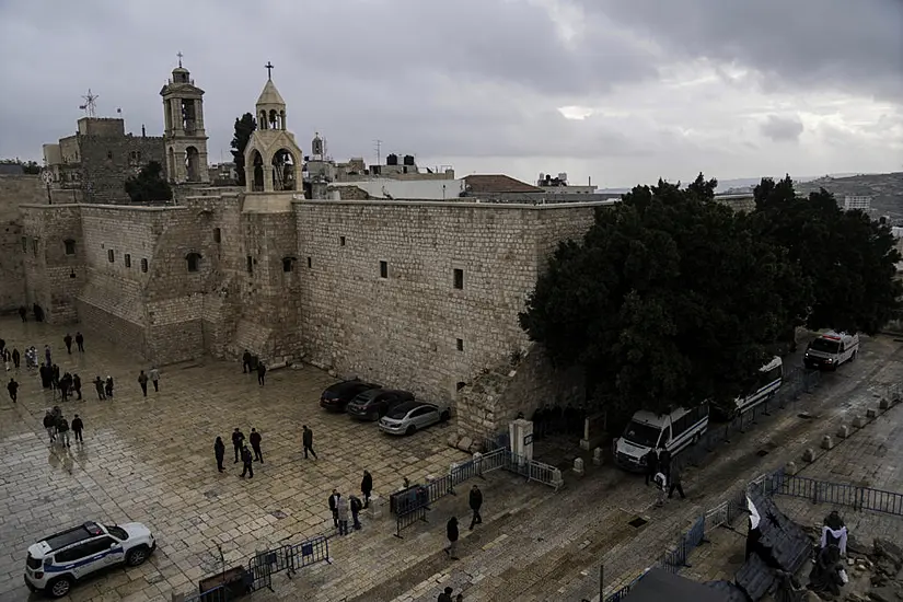 In Pictures: Christmas Celebrations Begin Worldwide But Are Muted In Bethlehem