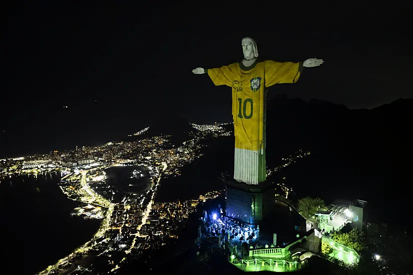 Christ The Redeemer Statue Illuminated With Brazil Shirt As Tribute To Pele