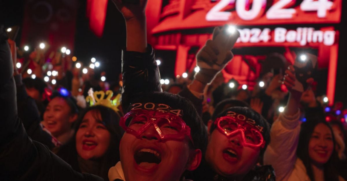 Купонджиите в цяла Азия празнуваха обратното броене до полунощ в