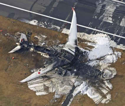 Officials Search For Voice Recorder In Debris Of Japan Runway Collision