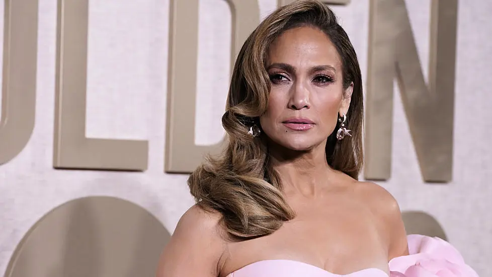 Jennifer Lopez Teases New ‘Meta’ Music Video On Golden Globes Red Carpet