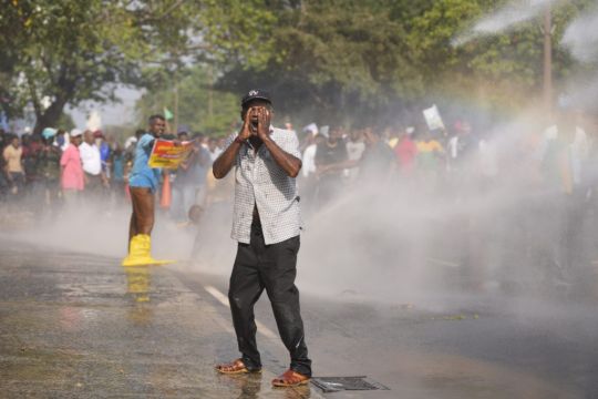 Protesters Demonstrating Over Living Costs Hit With Tear Gas And Water Cannon