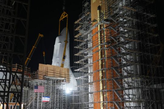Retired Shuttle Endeavour Is Hoisted Into Launch Position At New Museum