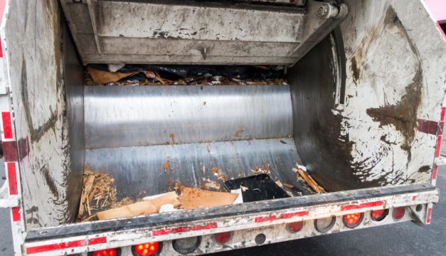 Woman Throwing Out Rubbish Survives Being Compacted In Bin Lorry