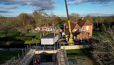 Crane Lifts Pool Out Of Spa Block At Home Of Captain Tom’s Family