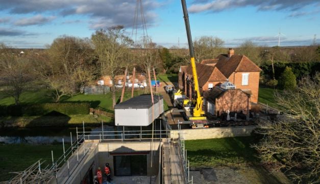 Crane Lifts Pool Out Of Spa Block At Home Of Captain Tom’s Family