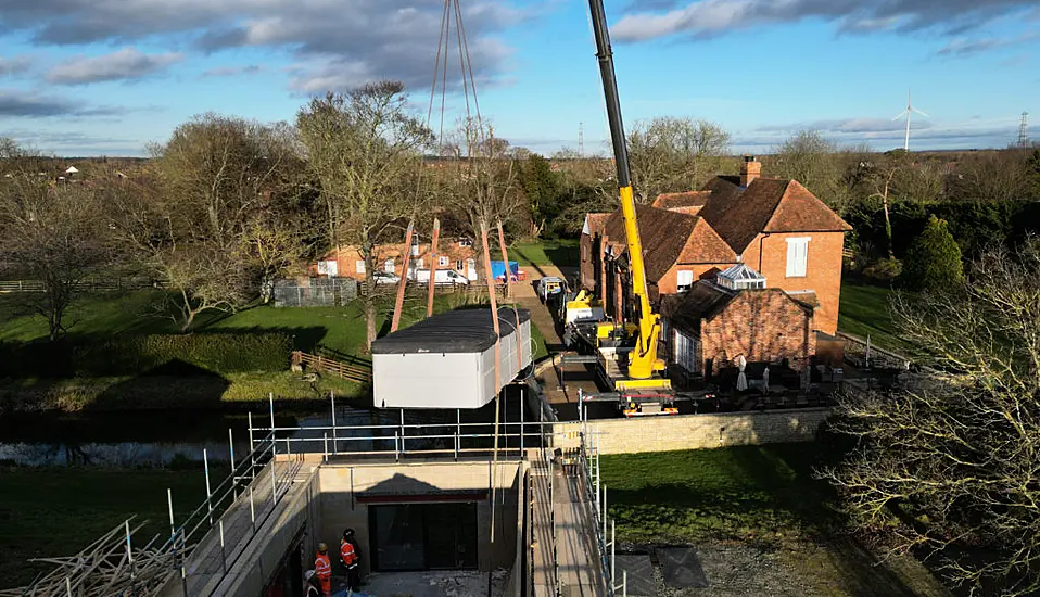 Crane Lifts Pool Out Of Spa Block At Home Of Captain Tom’s Family