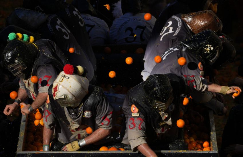 Pulp Flies In Traditional Orange Battle During Italian Carnival