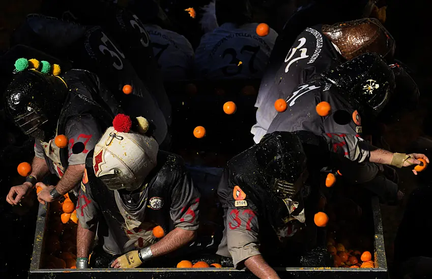 Pulp Flies In Traditional Orange Battle During Italian Carnival