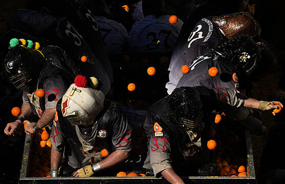 Pulp Flies In Traditional Orange Battle During Italian Carnival