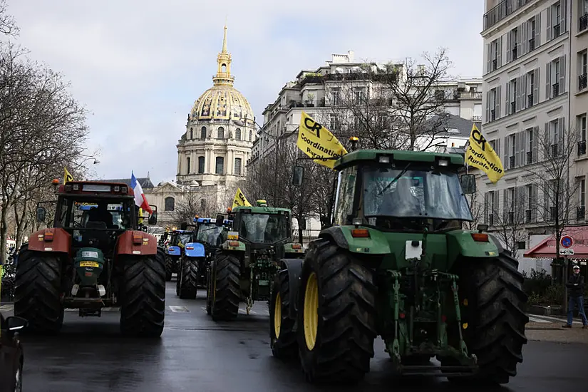 French Farmers Take Tractors Back On The Streets Of Paris In New Protest