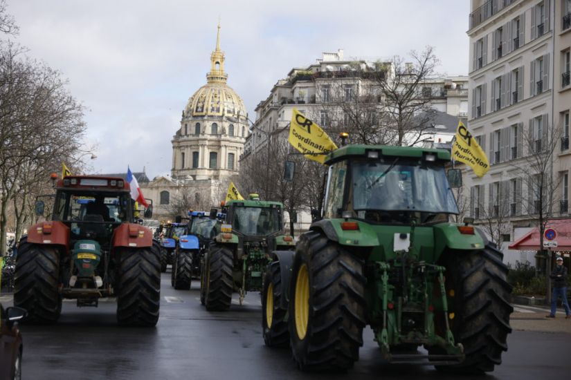 French Farmers Take Tractors Back On The Streets Of Paris In New Protest
