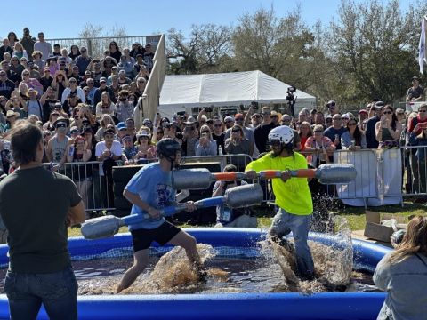 Tank-Topped Teams Compete In Spoof Sporting Event In Florida