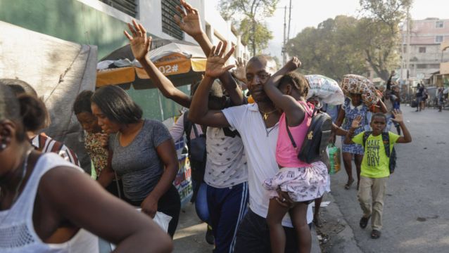 Gunfire Paralyses Haiti's Capital As Gang Leader Threatens Police Chief