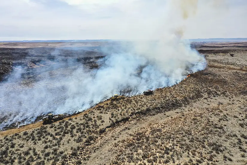 Firefighters Face Difficult Weather Conditions Amid Texas Wildfire Battle