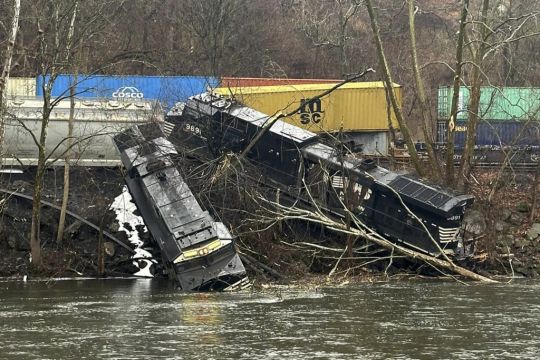 Train Carriages Scattered Along Riverbank After Pennsylvania Crash