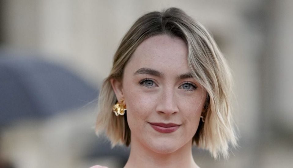 Saoirse Ronan Among Stars At Louis Vuitton's Paris Fashion Week Show