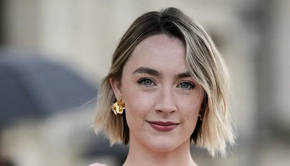 Saoirse Ronan Among Stars At Louis Vuitton's Paris Fashion Week Show