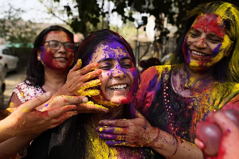 Indians Mark The Reawakening Of Spring At Holi, The Hindu Festival Of Colour