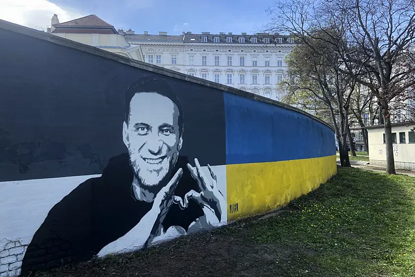 Portraits Of Alexei Navalny Unveiled Next To Soviet Soldier Monument In Vienna