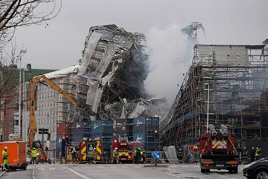 Firefighters Tackle Scaffolding Dangling Outside Fire-Ravaged Danish Landmark