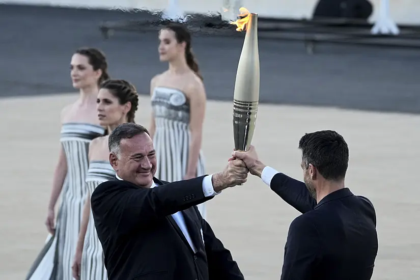 Paris Organisers Receive Olympic Flame At Greek Venue Of First Modern Games