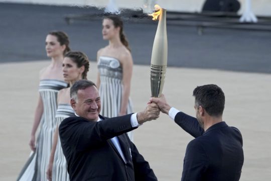 Paris Organisers Receive Olympic Flame At Greek Venue Of First Modern Games
