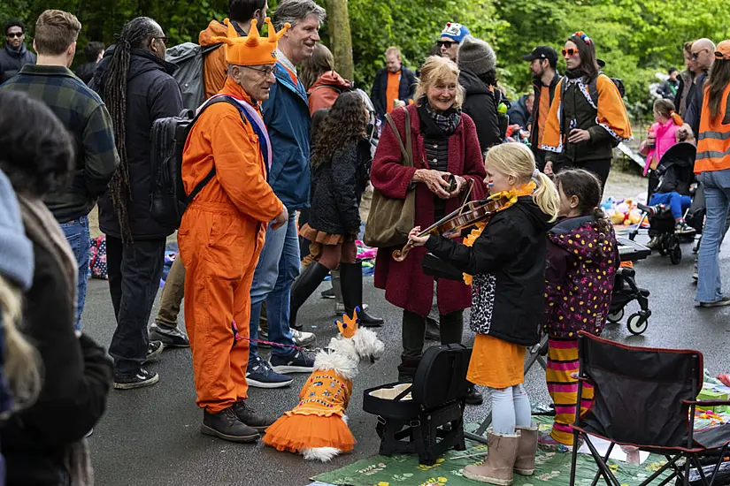 Revellers Dress In Orange To Celebrate Dutch King’s Birthday