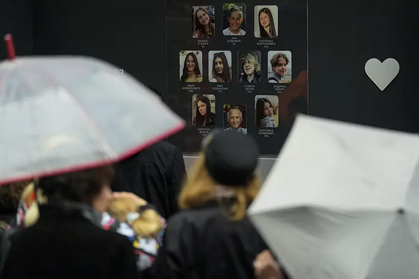 Flowers, Candles And Silence As Serbia Marks Anniversary Of School Shooting