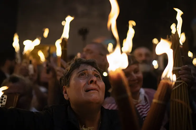 Orthodox Worshippers Greet Ancient Ceremony Of The Holy Fire In Jerusalem