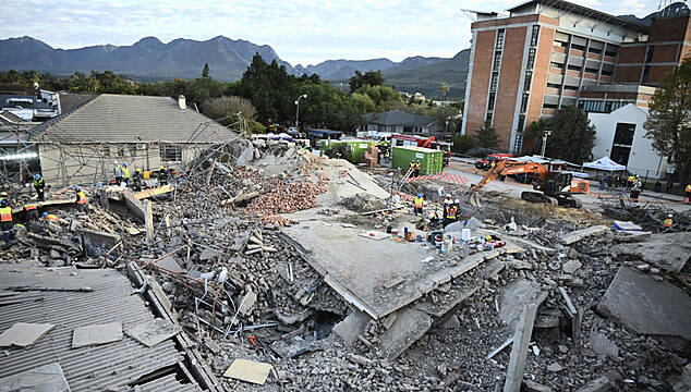 Rescuers Bring Survivors From The Rubble After Building Collapse In South Africa