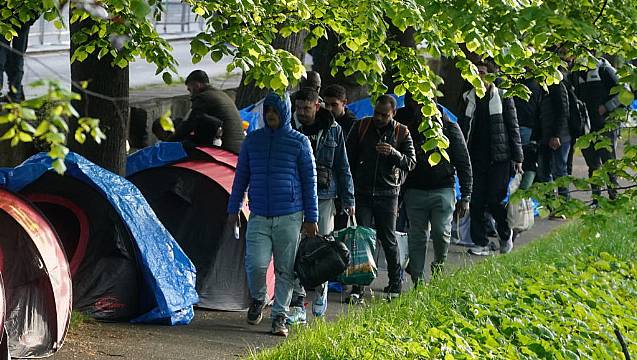 Harris Hails ‘Team Ireland’ Operation As 163 Migrants Are Removed From Camp