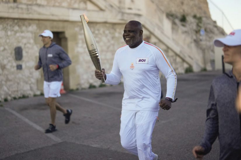 Torchbearers In Marseille Kick Off Olympic Flame’s Journey Across France