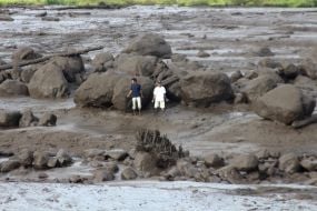 Flash Floods Caused By Heavy Rain And Cold Lava Flow Kill 37 In Indonesia