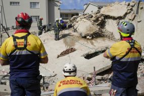 Rescue Effort Boosted As Survivor Found After South Africa Building Collapse