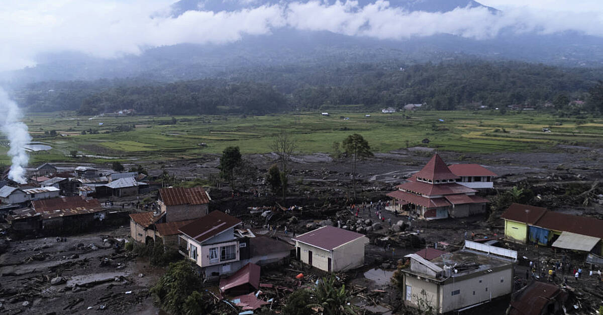 Indonesian Rescuers Search Through Rivers And Rubble After Flash Floods