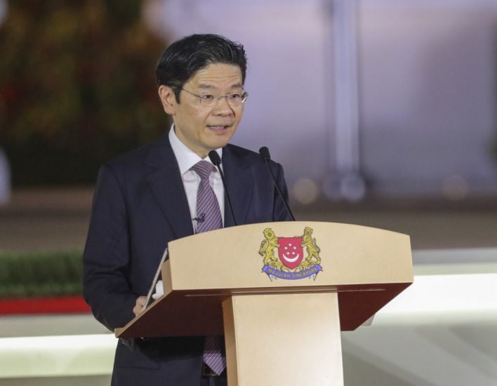 Singapore’s New Prime Minister Vows To ‘Lead In Our Own Way’ As Lee Dynasty Ends