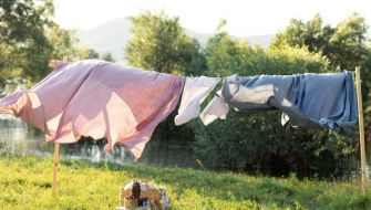 Should You Wash Your Bedsheets More Often In The Summer?