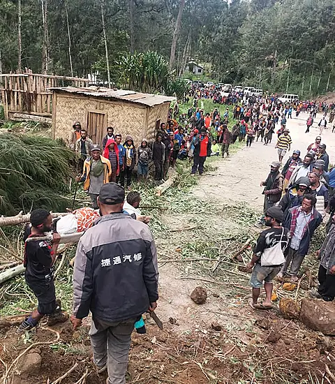 Emergency Convoy Takes Aid To Survivors Of Papua New Guinea Landslide