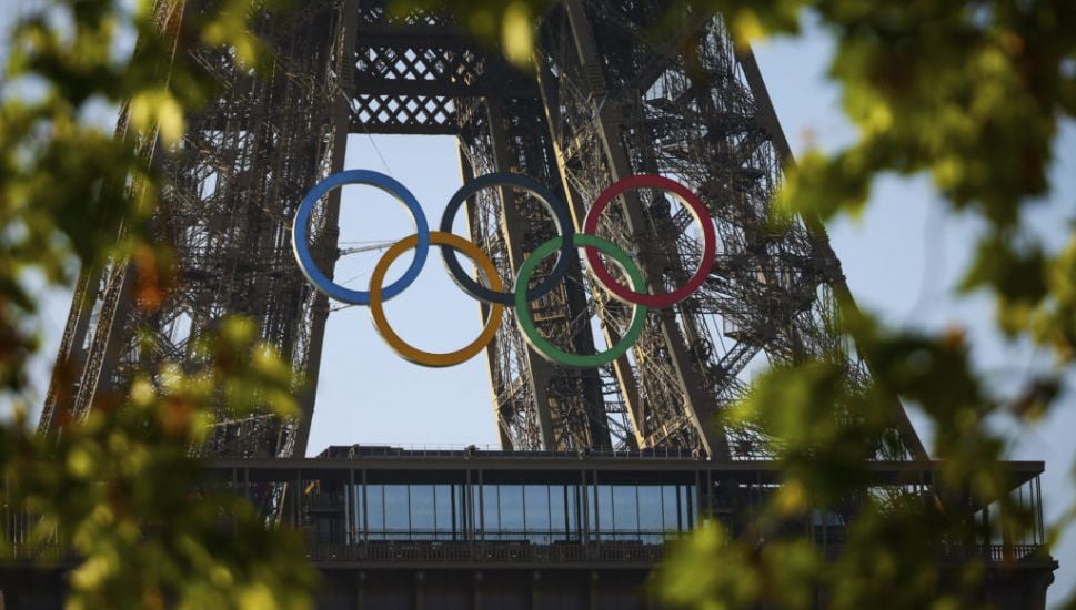 Paris Organisers Unveil Five Olympic Rings Mounted On Eiffel Tower