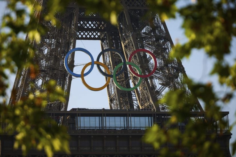 Paris Organisers Unveil Five Olympic Rings Mounted On Eiffel Tower