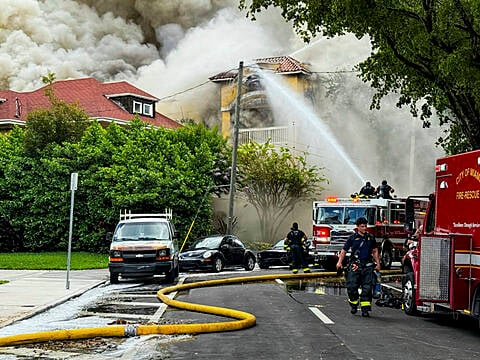 Firefighters Tackle Massive Blaze At Apartment Complex In Miami