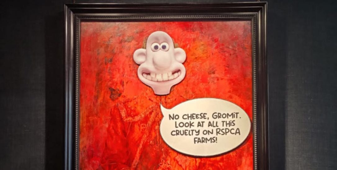 Charles' Face Replaced With Wallace And Gromit Character In Animal Rights Protest