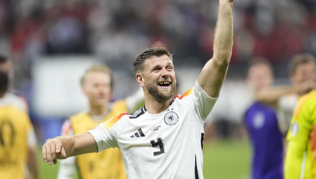 Niclas Fullkrug’s last-gasp header snatches Germany top spot in Group A
