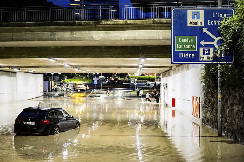 Clean-Up Begins After Sudden Storms Flood Roads And Halt Air Traffic In Geneva