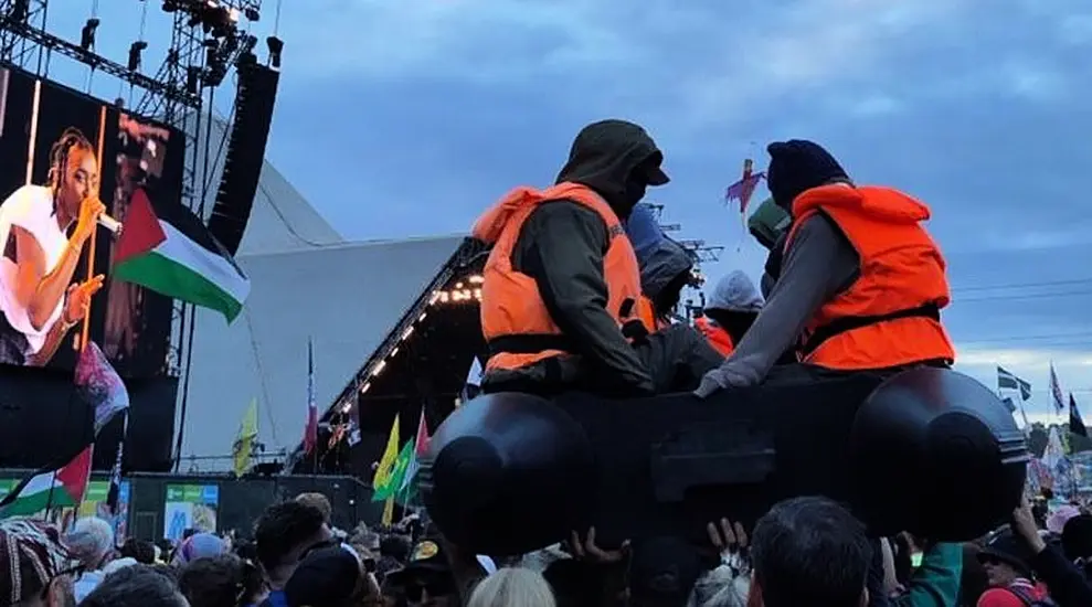 Banksy Slams Uk Home Secretary’s Criticism Of His Glastonbury Small Boats Artwork