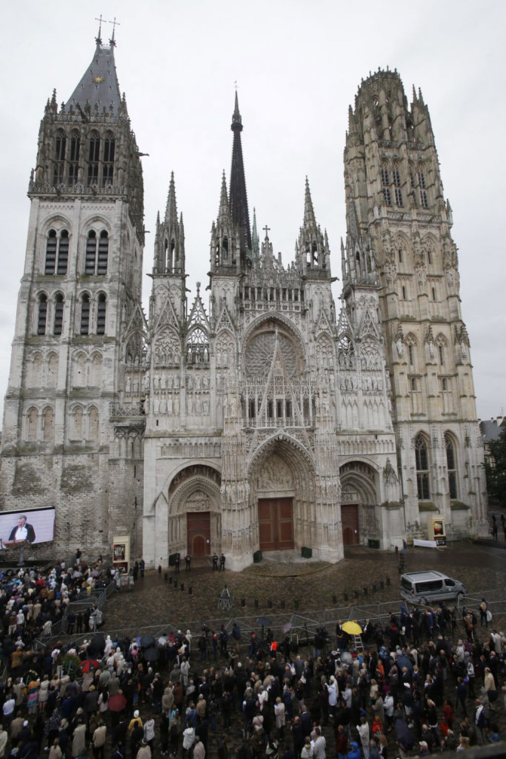 Fire in spire of medieval cathedral in French city of Rouen under control