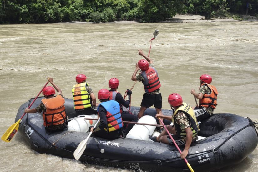 Eleven Bodies Recovered In Nepal After Landslide Sweeps Two Buses Into River