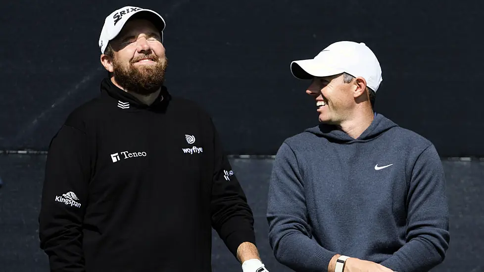 Open Day Three: Rory Mcilroy Supporting Leader Shane Lowry After Missing The Cut