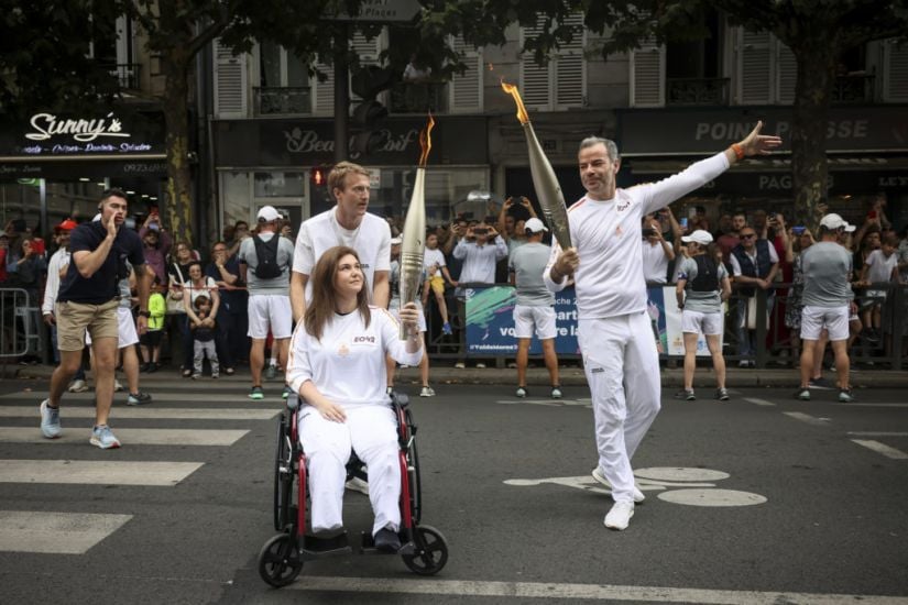 Wounded Lebanese Photojournalist Carries Olympic Torch To Honour Journalists